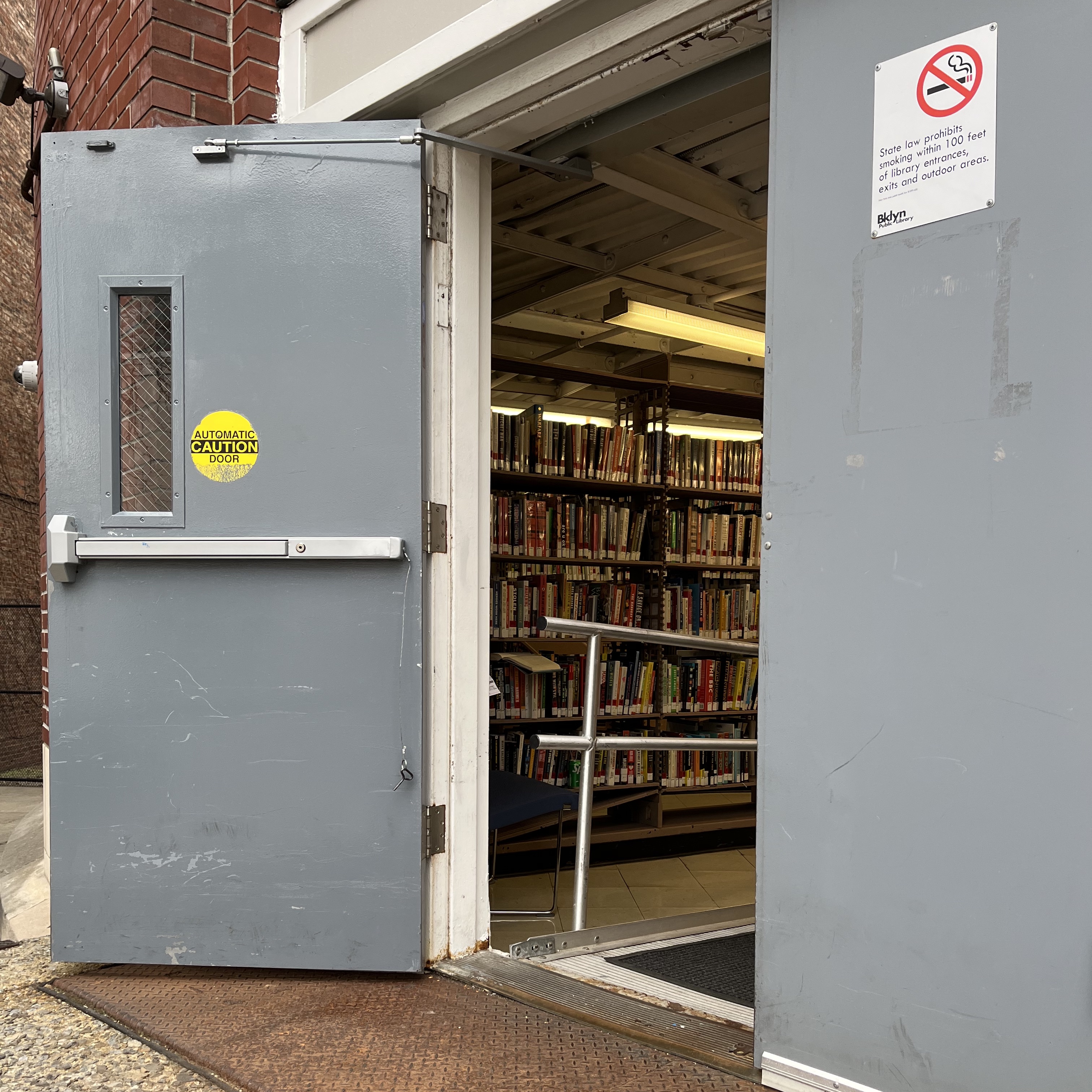 Back door of the Brooklyn Public Library branch on 4th Avenue, ajar.