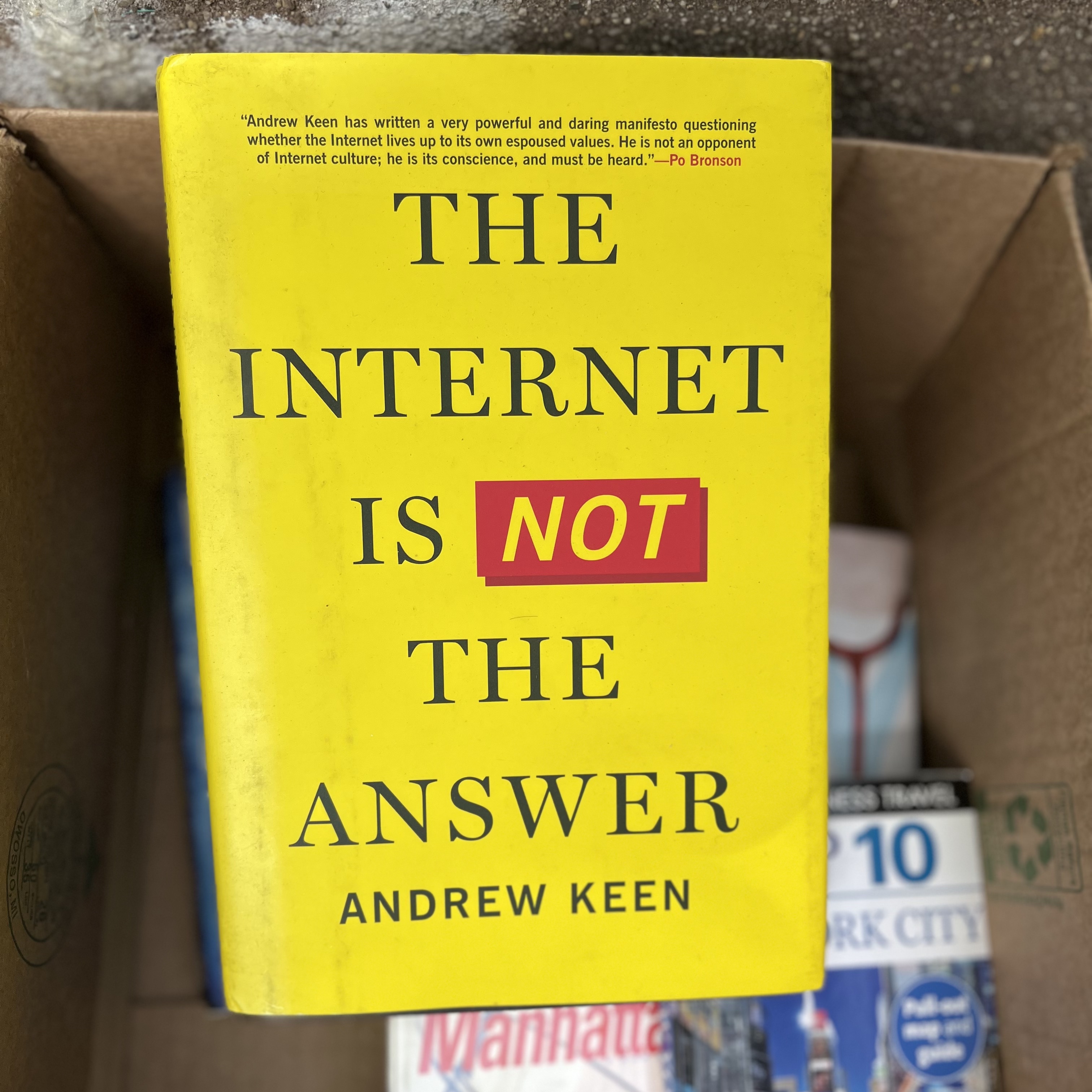 The Internet is Not the Answer. A guest photographer captures some free books up for grabs on Park Place in Brooklyn, NY.