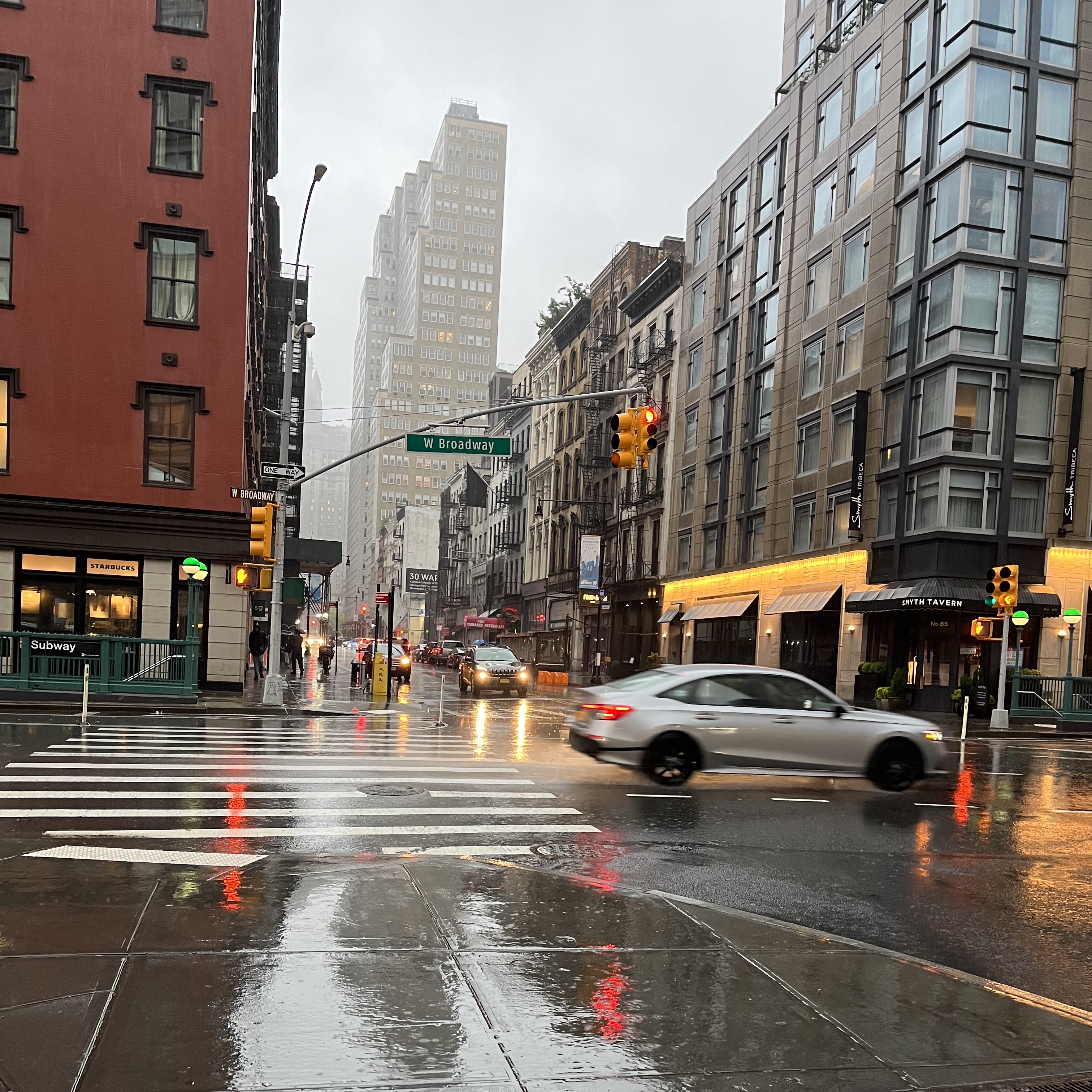 Rainy West Broadway and Reade Street in TriBeCa.