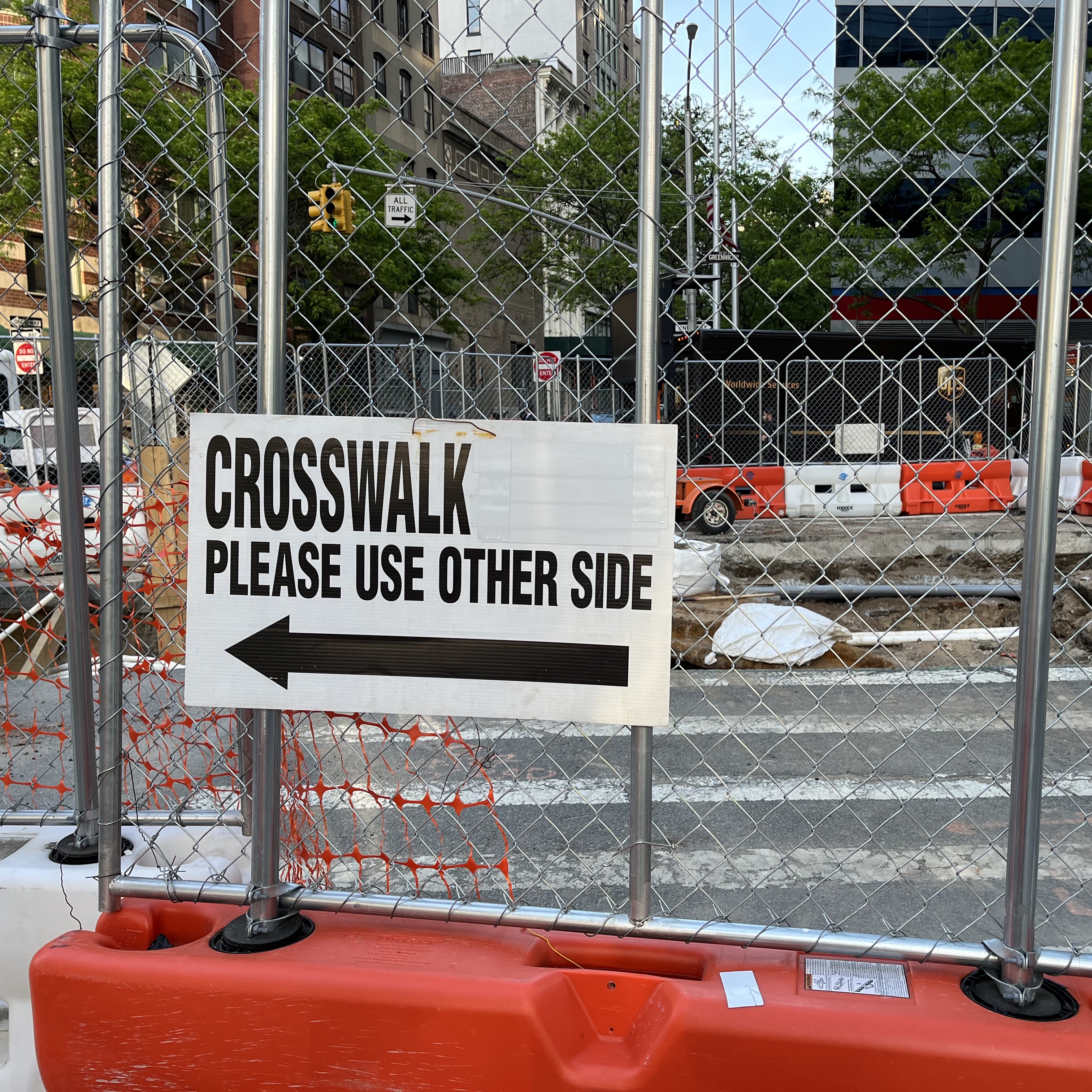 A big trench and no crosswalk at Greenwich and Murray in Lower Manhattan.