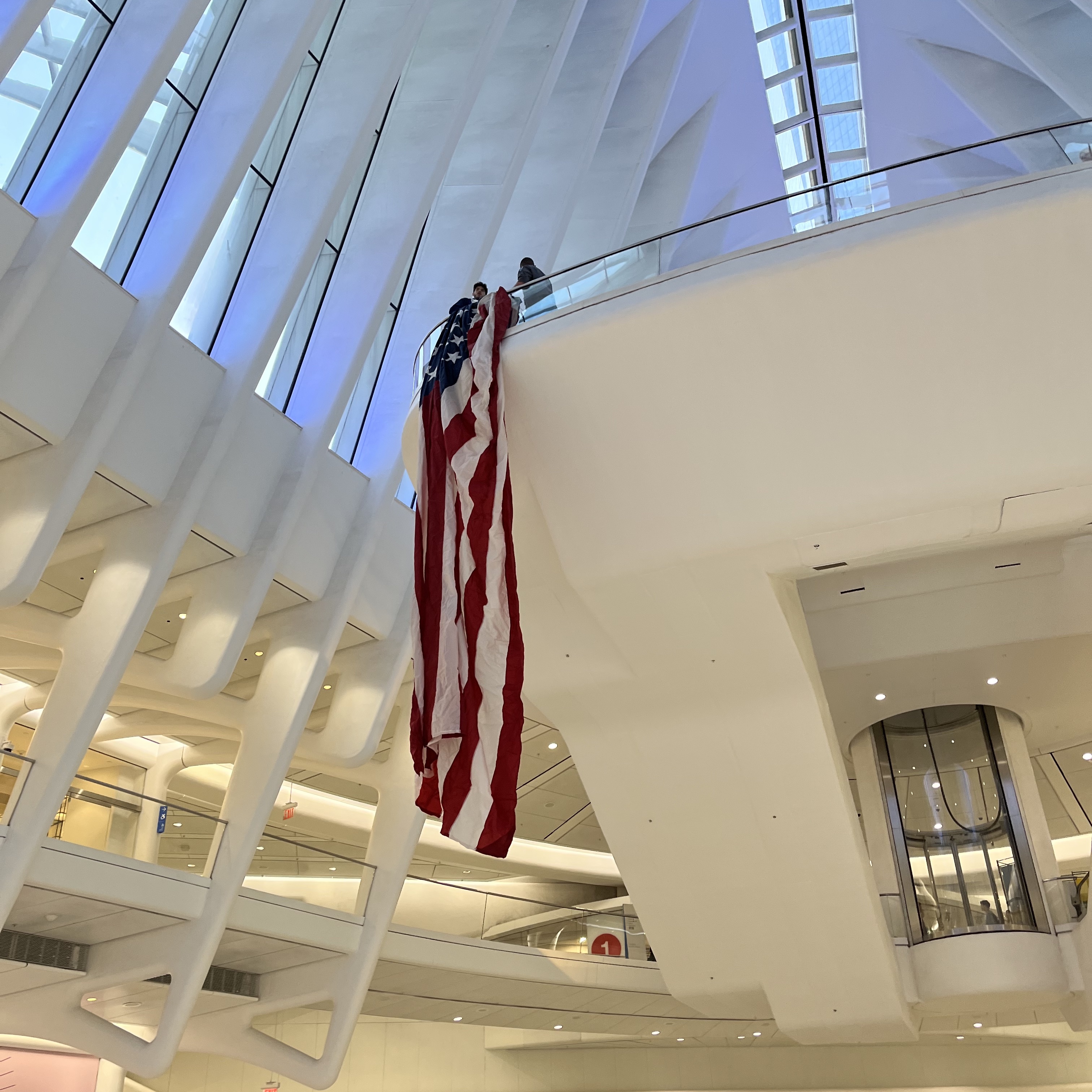 Setting up (or stealing) a large American flag at the Occulus.