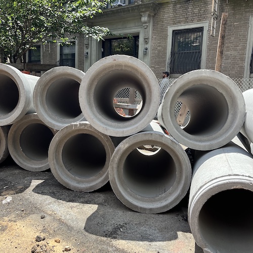 Big pipes in front of 250 Park Place, Prospect Heights, Brooklyn.