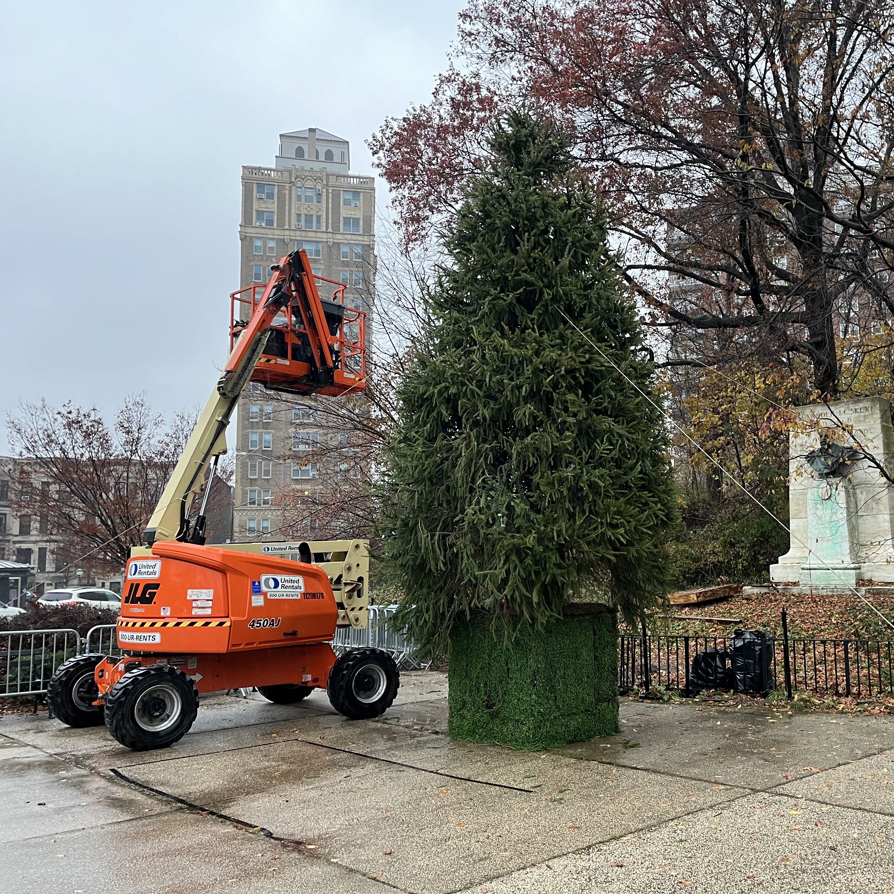 A Christmas tree is erected in an unusual place at Grand Army Plaza (due to arch restoration). Prospect Heights, Brooklyn.