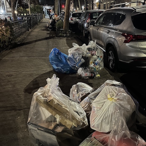 Post-holiday trash night, as far as the eye can see. Park Place, Prospect Heights, Brooklyn.