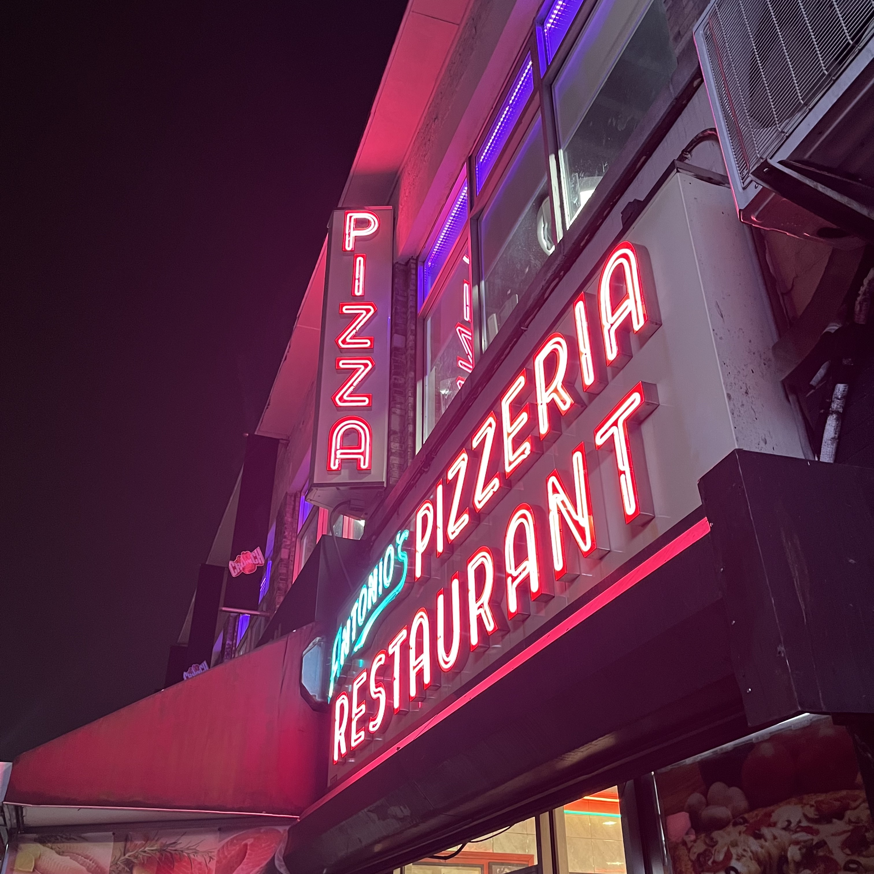 Antonio's Pizzeria neon sign on Flatbush Ave. Park Slope, Brooklyn.