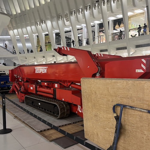 Heavy machinery in the Oculus. Usually this beast sits to the side, near the PATH station. Occasionally, they roll it out to do some work. World Trade Center, Manhattan.