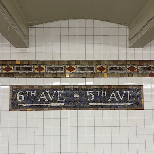 Tile directional subway signs. 42nd Street/Bryant Park Station, Manhattan.